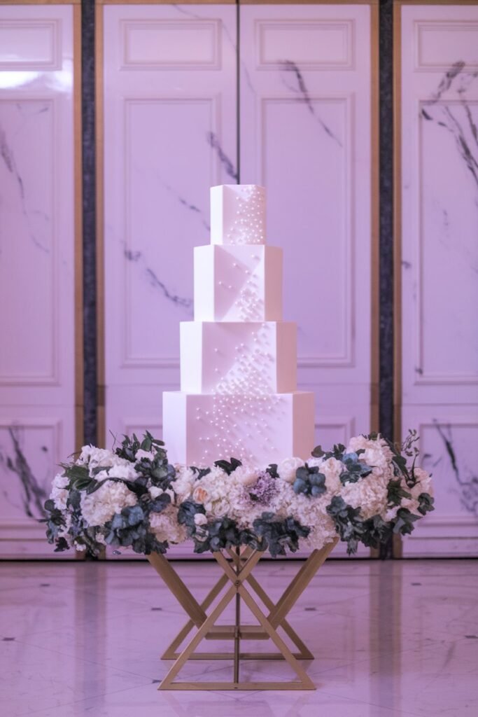 3. Modern Geometric Wedding Cake with Pearl Accents