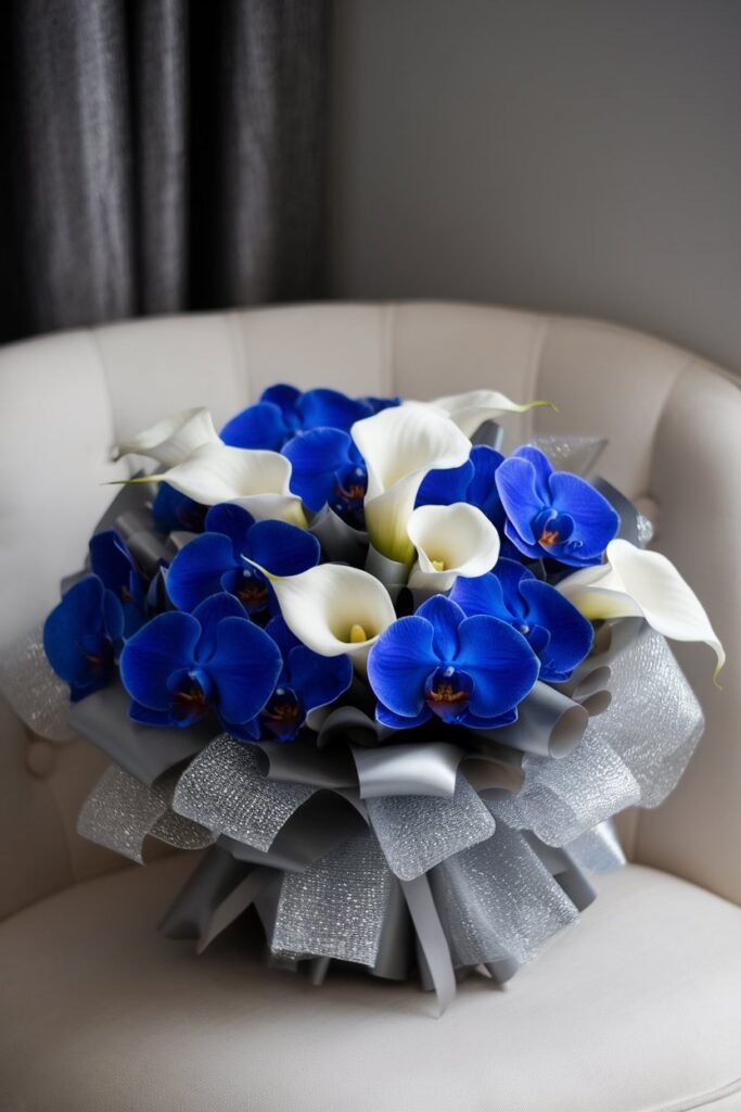 6. Elegant Blue Orchids and White Calla Lilies