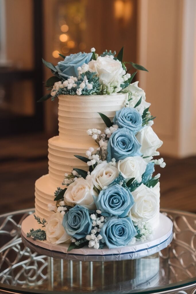 Timeless White Wedding Cake with Blue and Ivory Roses