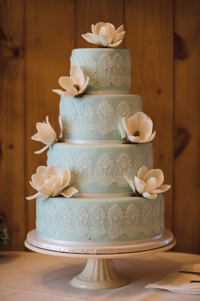 Graceful Wedding Cake with Lace and Magnolia Details